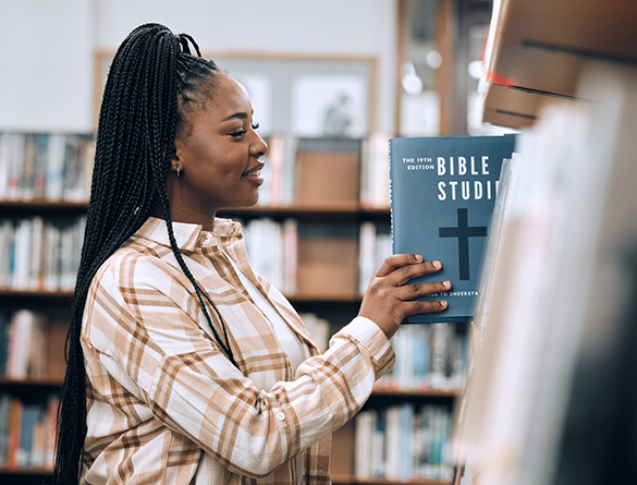 Woman holding Bible Stories